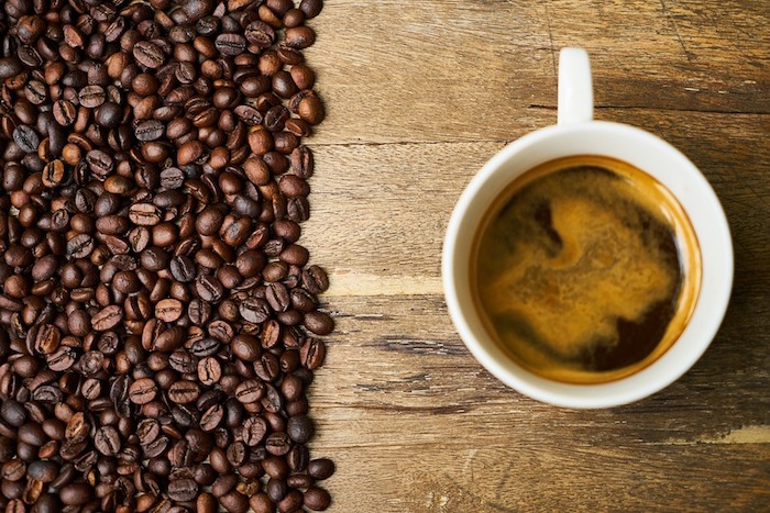 A good quality coffee cup and coffee beans