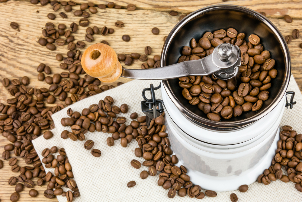 coffee grinder full of coffee beans - Can You Grind Frozen Coffee Beans