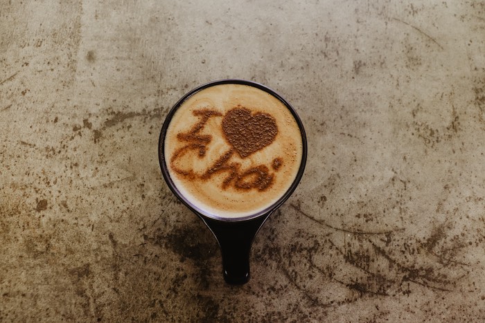 Does chai latte have sugar? Top view of Chai tea latte.