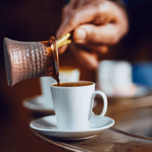 A cup of espresso coffee on a table.