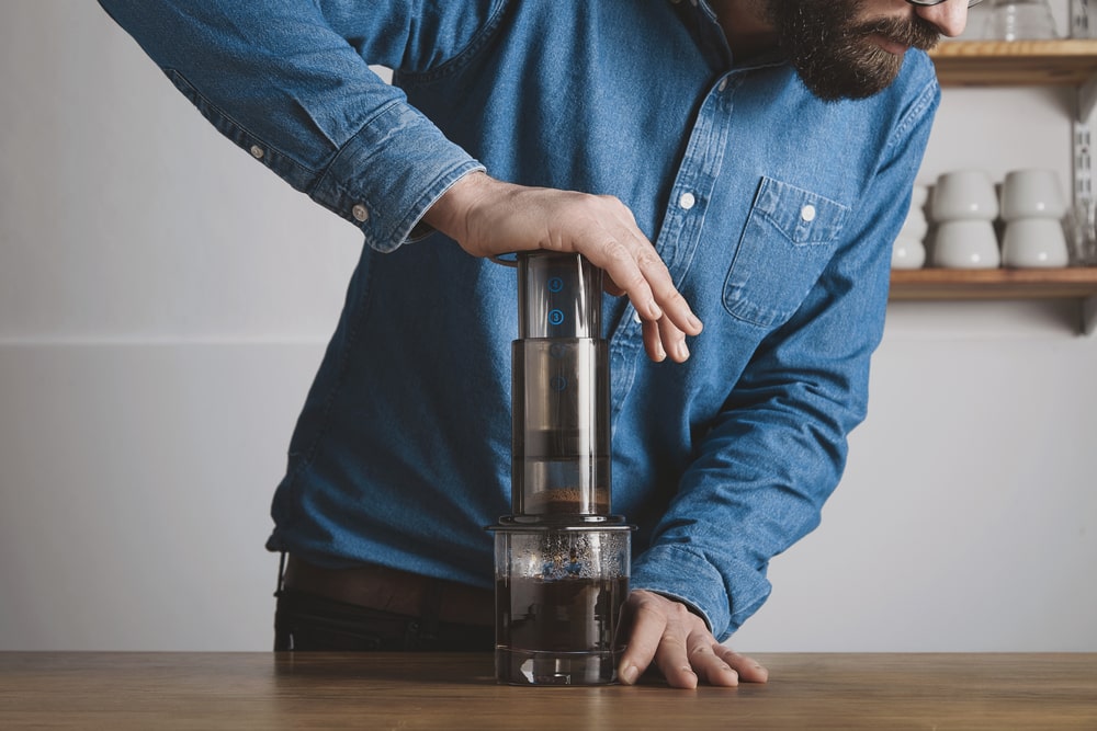 A man in a blue shirt