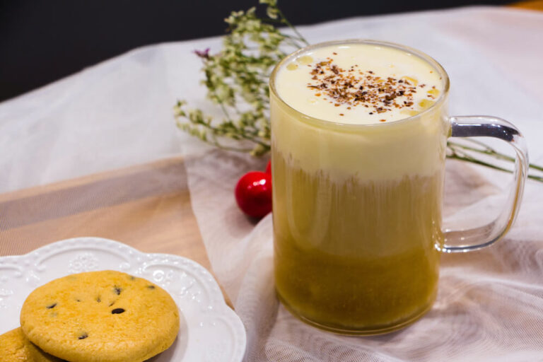 Jasmine green tea with milk in a clean glass - how to make jasmine milk tea