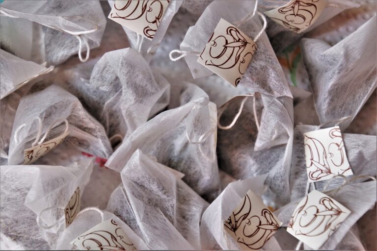 a number of tea bags laid on top of a flat surface - how many times can you use a tea bag