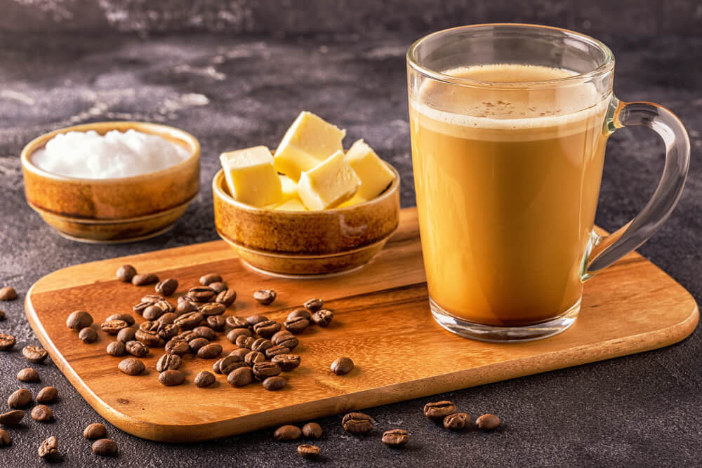 A glass of Bulletproof coffee, blended with organic butter