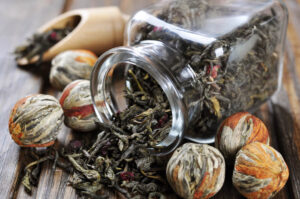 bunch of tea balls - how much tea goes in a tea ball