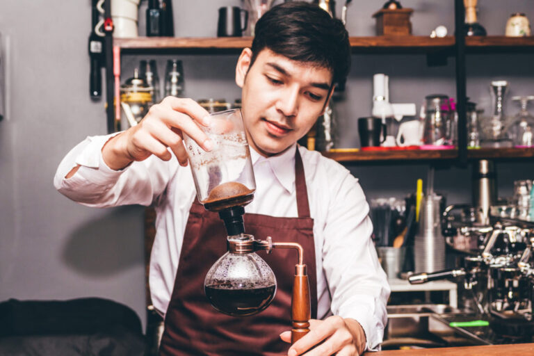 barista making a coffee