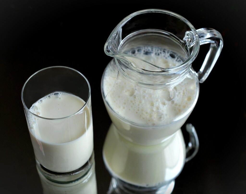 two glasses of frothed milk