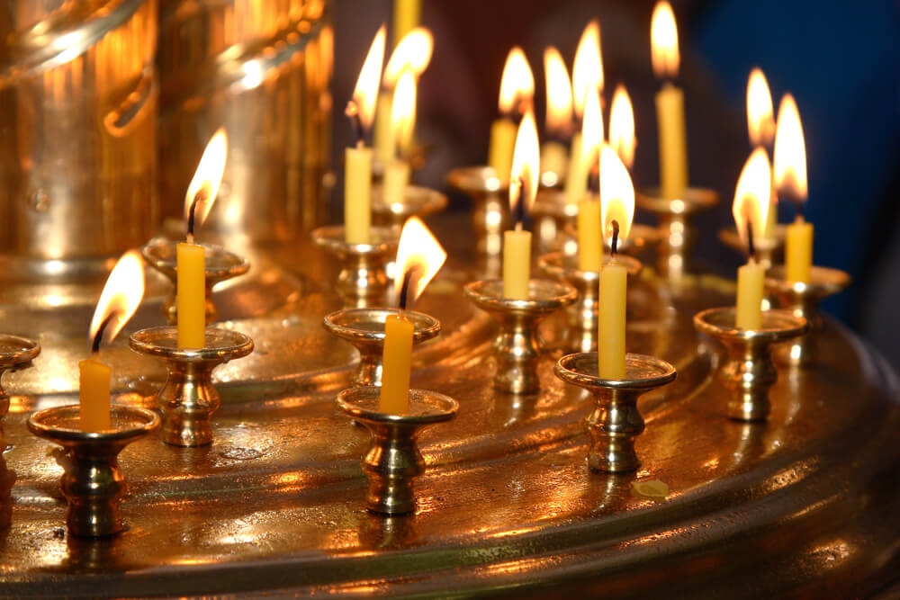 lighted candles arranged in circular manner