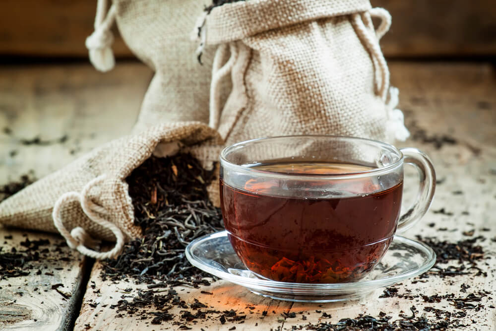 A cup of black tea with Keemun dried leaves - What is Keemun tea