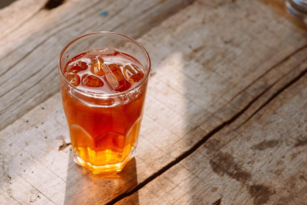 a glass of peace tea from coca cola company - What is peace tea