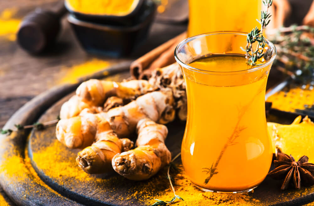 Healthy vegan turmeric golden tea with honey - What is turmeric tea