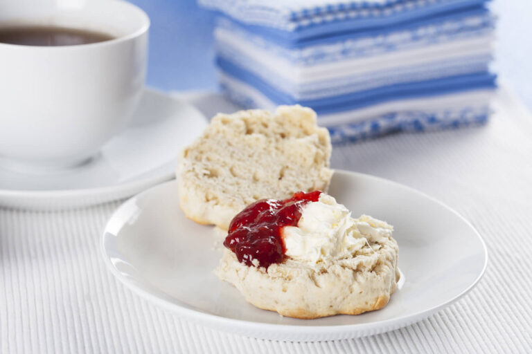 Scone with clotted cream and strawberry jam - Devon cream tea