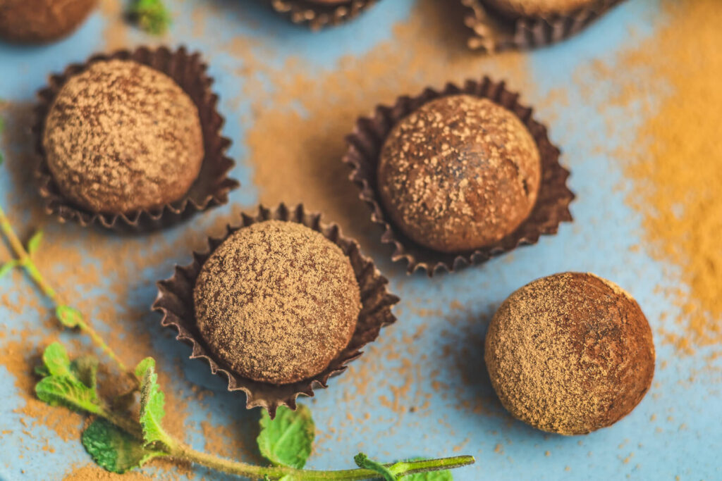 Handmade chocolate esppresso balls in a blue tray