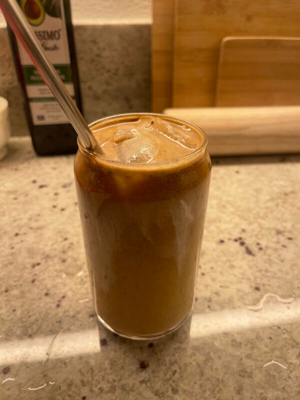 A glass of cold RYZE mushroom coffee