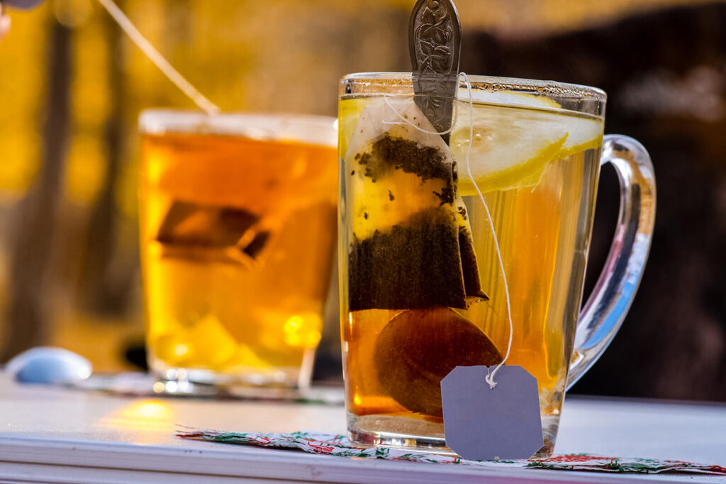 Transparent mug with tea bag