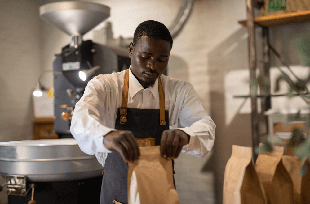 Man packing coffee beans