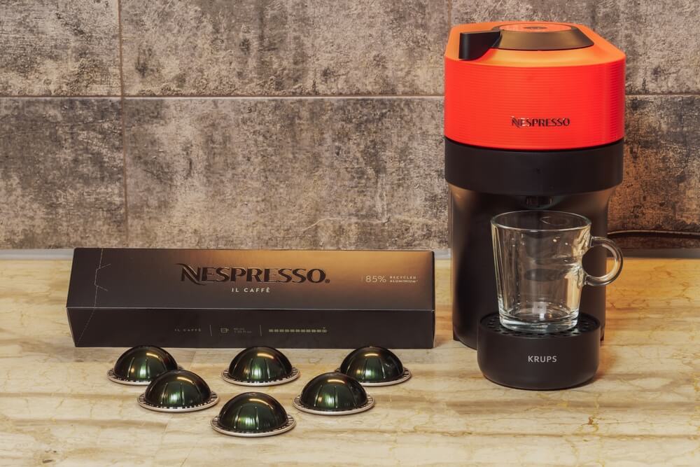 Automatic Nespresso Vertuo Pop machine used to create espresso with aluminum capsules