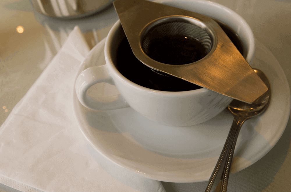 Teacup and strainer