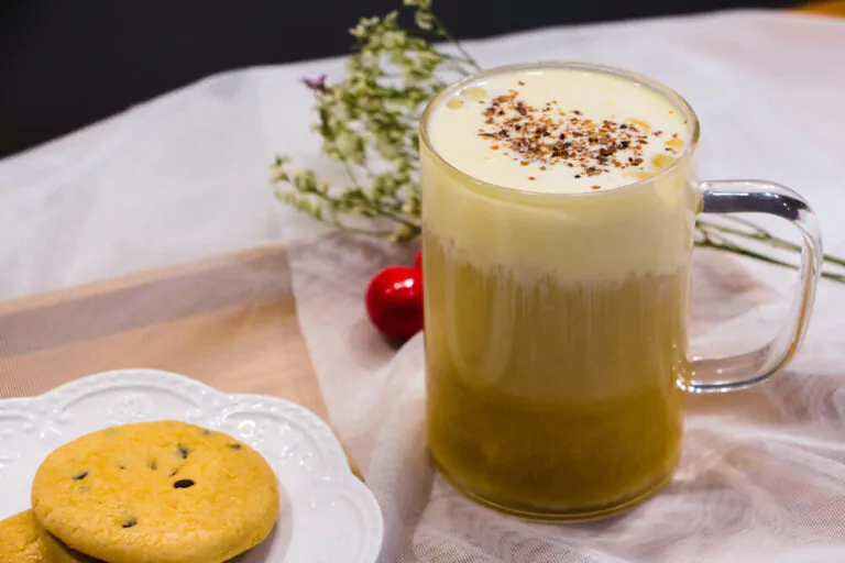 Jasmine green tea with milk in a clean glass - how to make jasmine milk tea