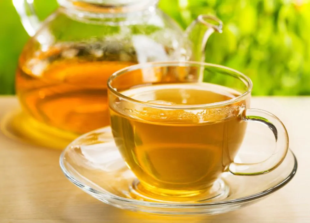 two cups of brewed tea in a table