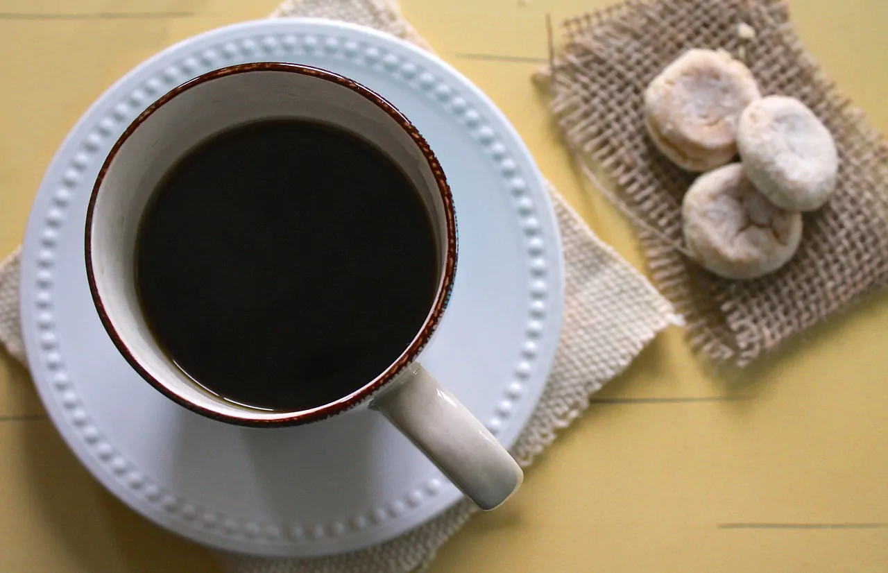 Milligrams of caffeine in a cup of coffee