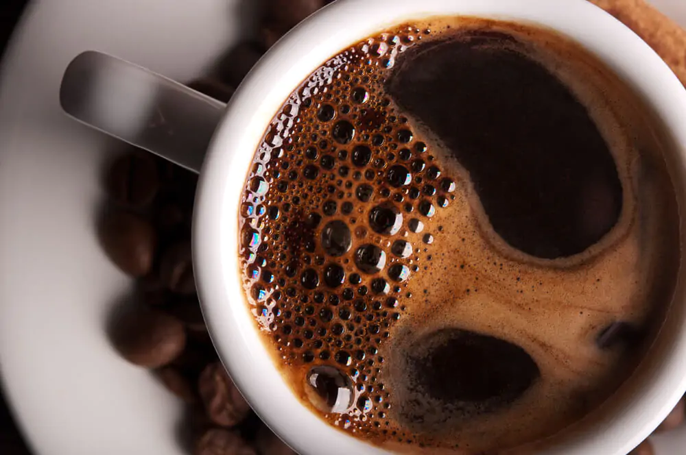 A mug filled with coffee - What is ultra green coffee